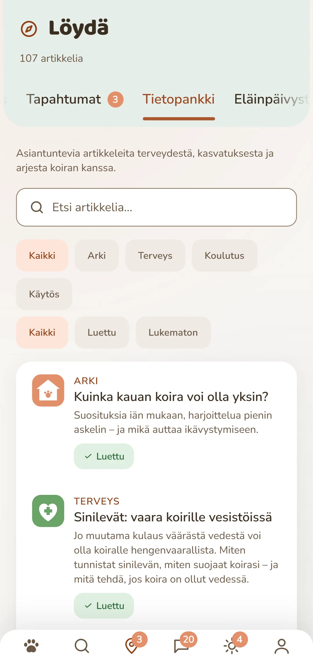 Kuvakaappaus DOGSY-sovelluksesta välilehdellä «Löydä»: ylimpänä artikkelien määrä, sen alla neljä välilehteä: Guide, Events, Tieto ja Eläimen hätätilanne. Sitten hakukenttä ja pyöreät suodattimet aiheille – Kaikki, Arki, Terveys, Käyttäytyminen, Kasvatus. Niiden alla artikkelit kortteina: vasemmalla värillinen aihesymboli, sen vieressä aihe suuraakkosin, otsikko ja lyhyt ingressi. Aivan alimpana sovelluksen navigointipalkki. Kuva näkyy tämän sivun kielellä.