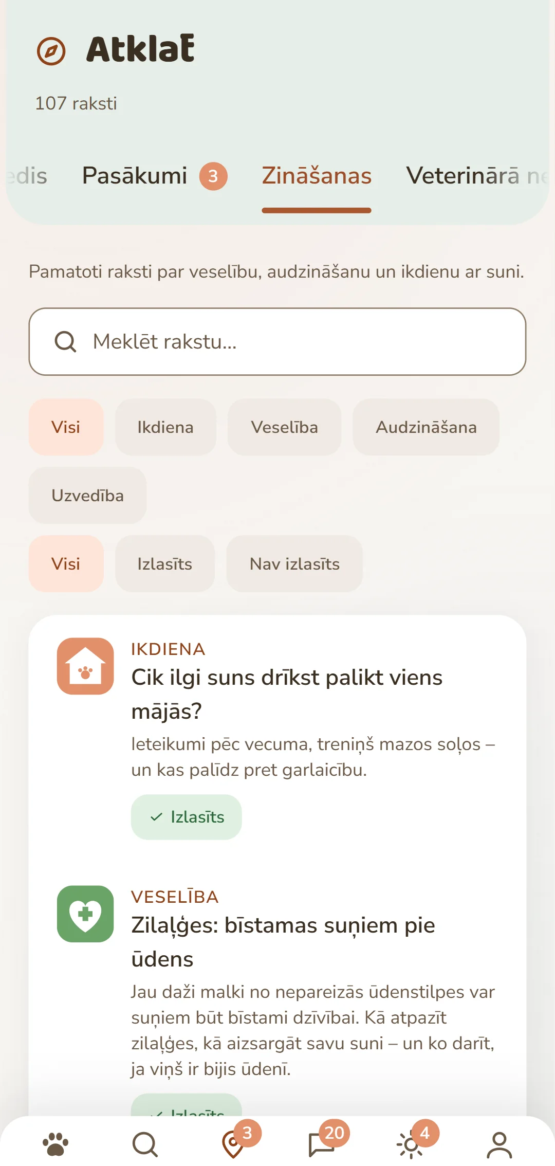DOGSY lietotnes ekrānuzņēmums cilnē Atklāt: pašā augšā rakstu skaits, zem tā četras cilnes Guide, pasākumi, zināšanas un dzīvnieku neatliekamā palīdzība. Tad seko meklēšanas lauks un apaļi rubriku filtri – Visi, Ikdiena, Veselība, Uzvedība, Apmācība. Zem tiem raksti kā kartītes: pa kreisi krāsaina rubrikas ikona, blakus rubrika lielajiem burtiem, virsraksts un īss ievads. Pavisam apakšā lietotnes navigācijas josla. Ekrānuzņēmums ir šīs lapas valodā.