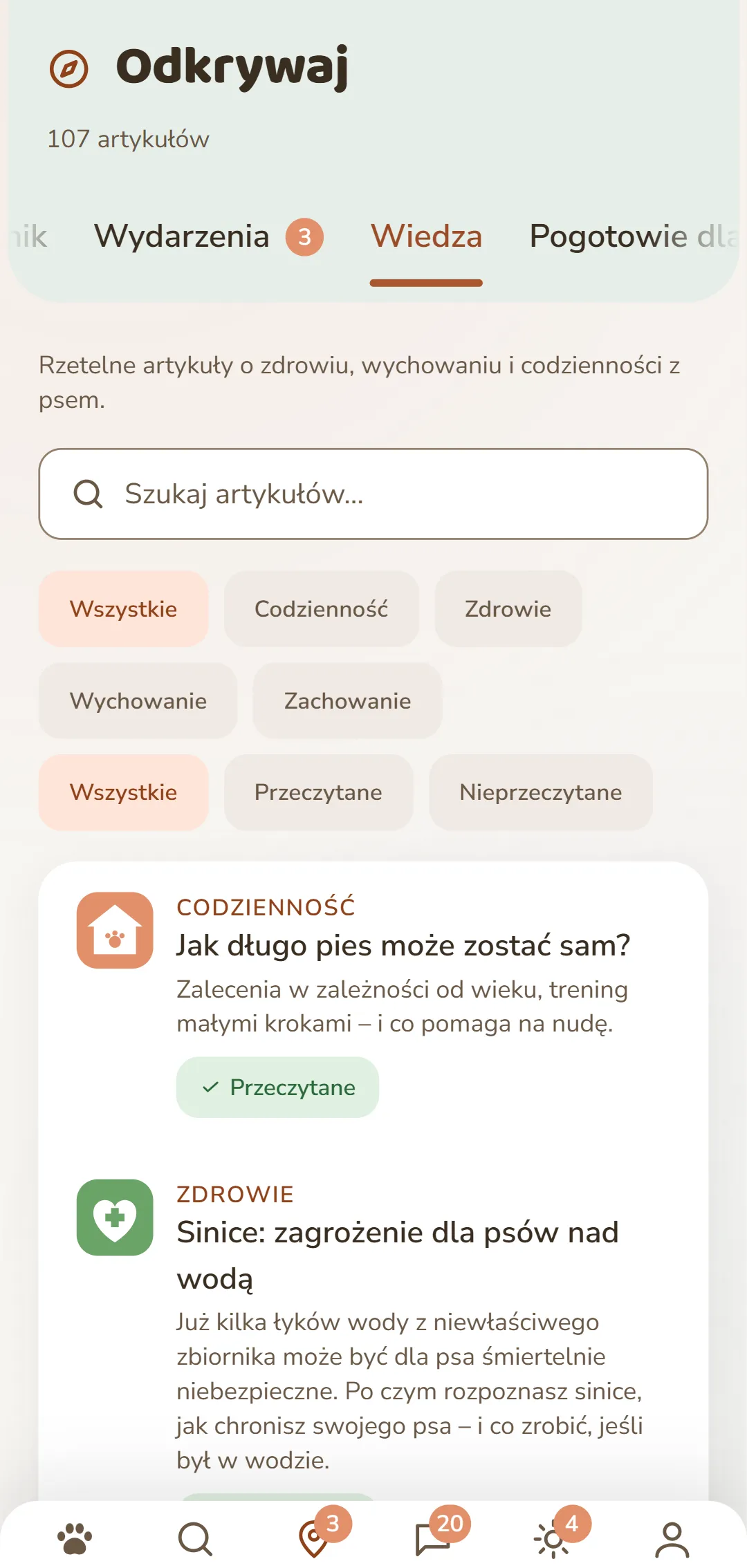 Zrzut ekranu z aplikacji DOGSY w zakładce «Odkrywaj»: na samej górze liczba artykułów, pod nią cztery zakładki Guide, Events, Wiedza i Nagły wypadek. Dalej pole wyszukiwania i okrągłe filtry rubryk – Wszystkie, Codzienność, Zdrowie, Zachowanie, Wychowanie. Poniżej artykuły jako karty: po lewej kolorowy symbol rubryki, obok nazwa rubryki wielkimi literami, tytuł i krótka zapowiedź. Na samym dole pasek nawigacji aplikacji. Zrzut ekranu jest w języku tej strony.