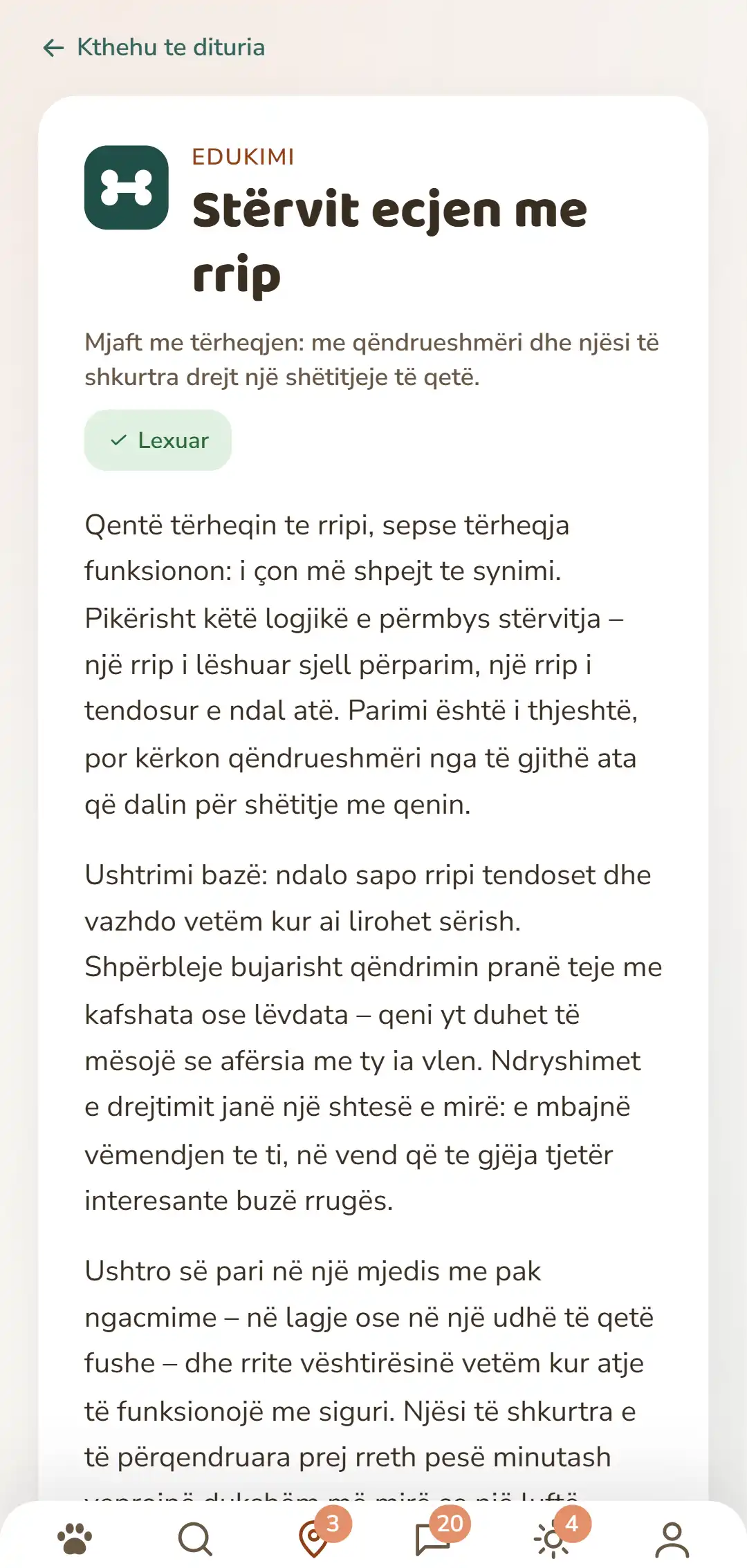 Pamje nga aplikacioni DOGSY: një artikull i hapur nga rubrika Njohuri. Krejt lart rruga e kthimit te lista, poshtë saj katër skedat Guide, Events, Njohuri dhe Urgjencë për kafshët. Vijojnë simboli me ngjyrë i rubrikës, rubrika me shkronja të mëdha, titulli, një hyrje e shkurtër dhe disa paragrafë tekst. Krejt në fund shiriti i navigimit të aplikacionit. Pamja shfaqet në gjuhën e kësaj faqeje.